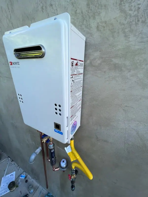 Tankless water heater installation for P and E Junction homes